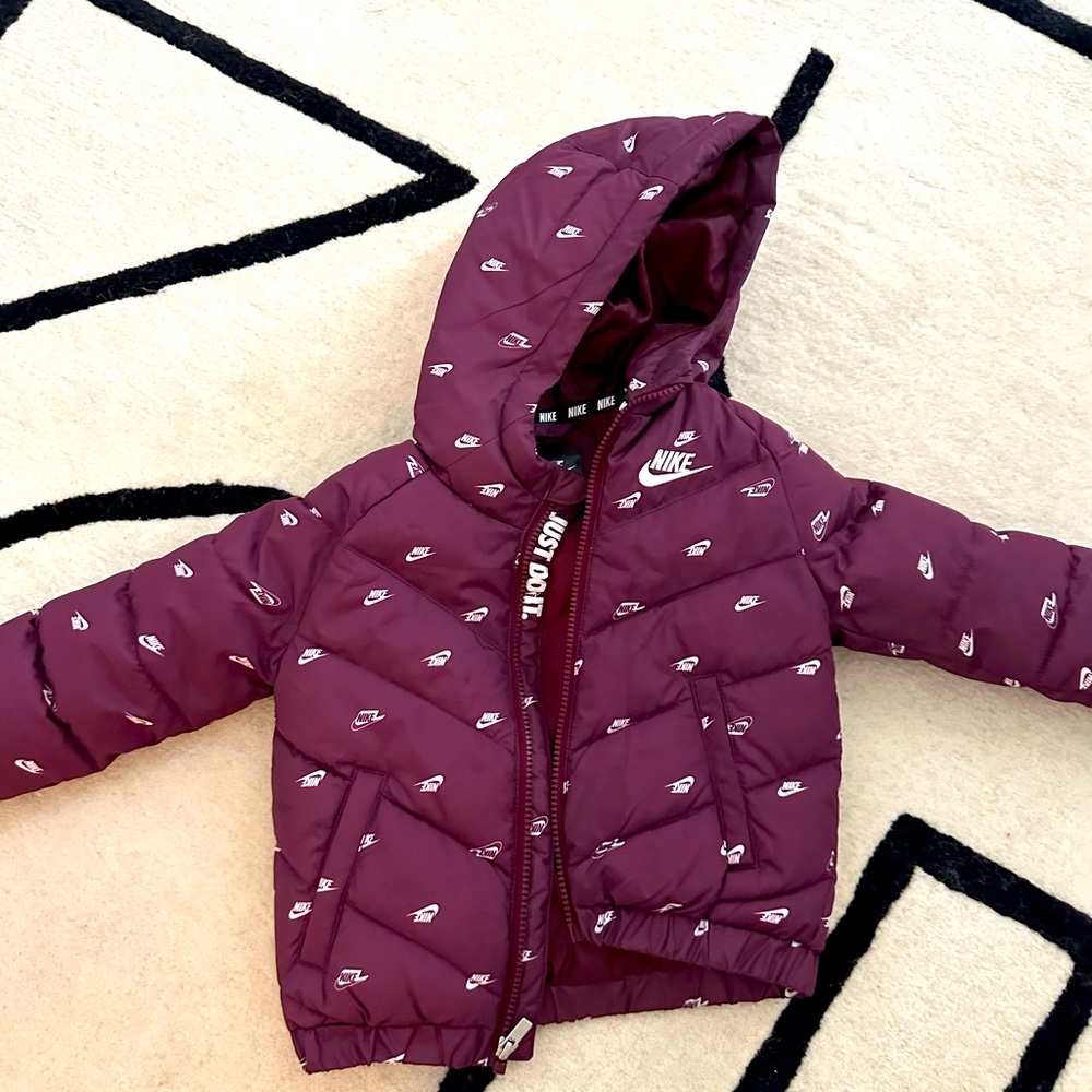 This is an authentic but well used jacket. Nike. Size 3T $20